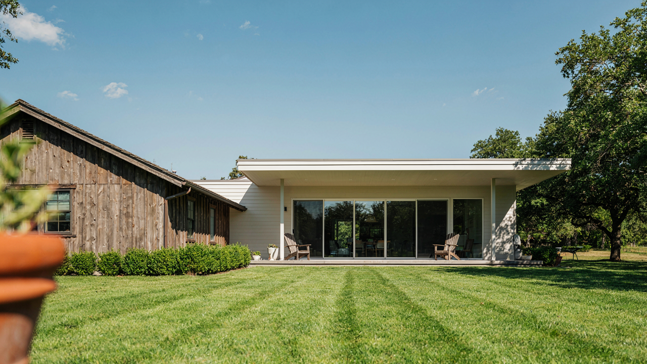 A modern ranch house addition shows how new and old can blend together.