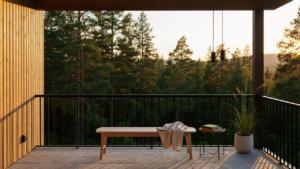 A modern Scandinavian cabin porch with light wood and black railings at sunset.