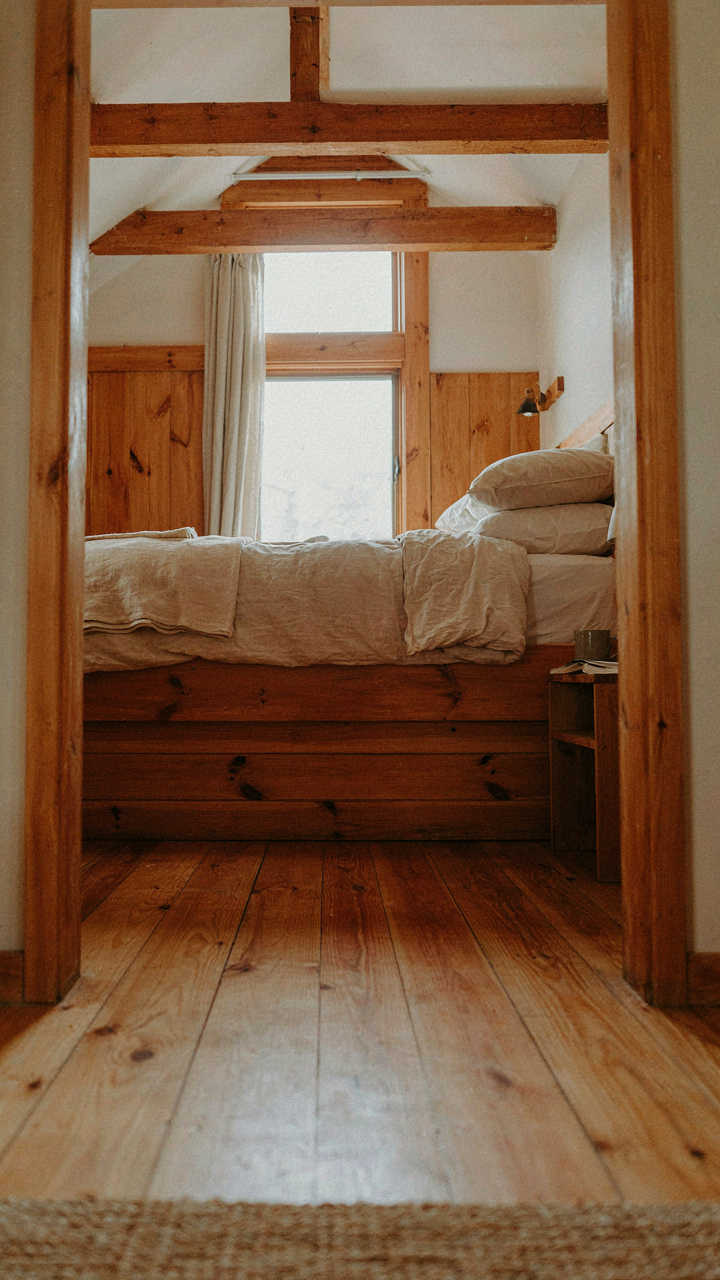 A spacious, well-designed loft for sleeping in a small cabin.