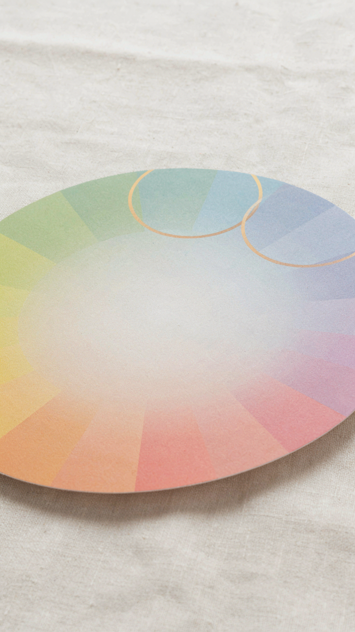 Three adjacent colors on a color wheel, a soft sage, a muted blue-green, and a dusty blue.