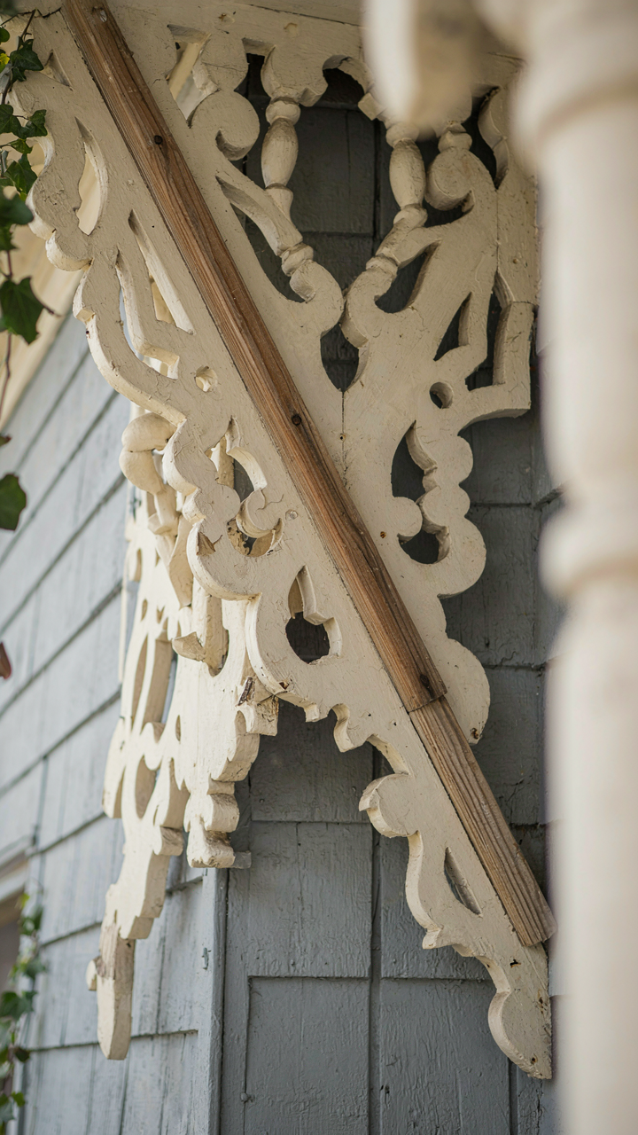 Victorian porch gingerbread trim with a subtle diagonal brace.