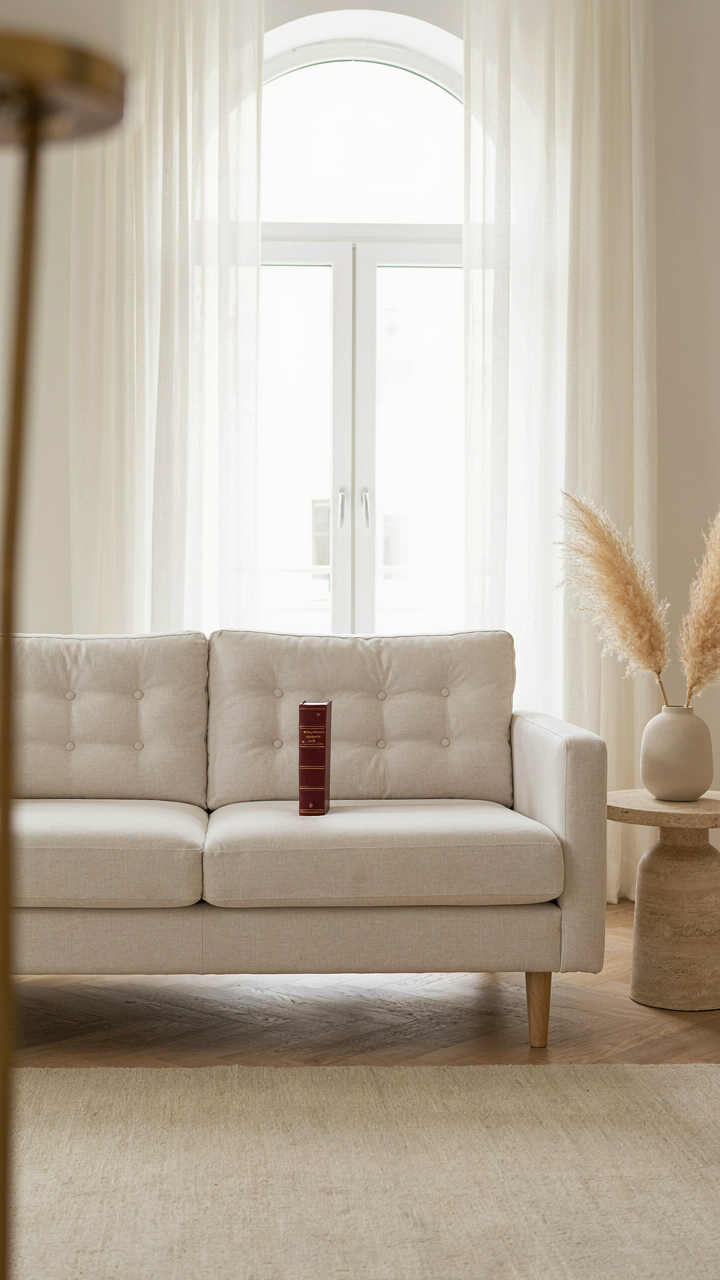 A perfectly staged living room, appearing unnatural and overly curated.