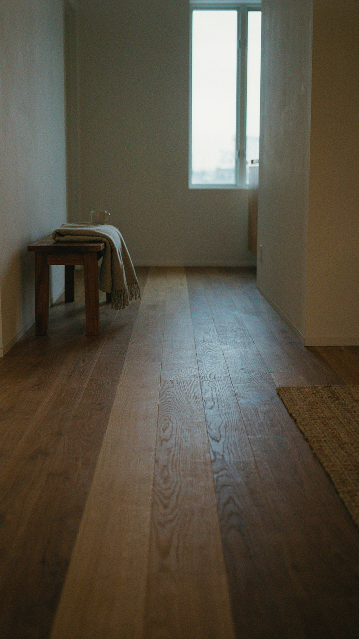 A distinct path on the floor defines zones in a tiny cabin interior.