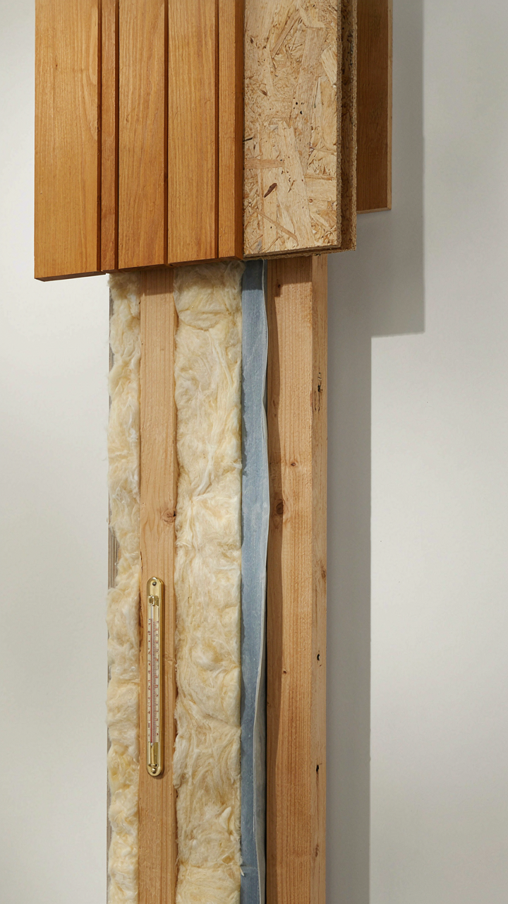 A diagram of a well-insulated scandinavian tiny house wall, showing thermal efficiency.