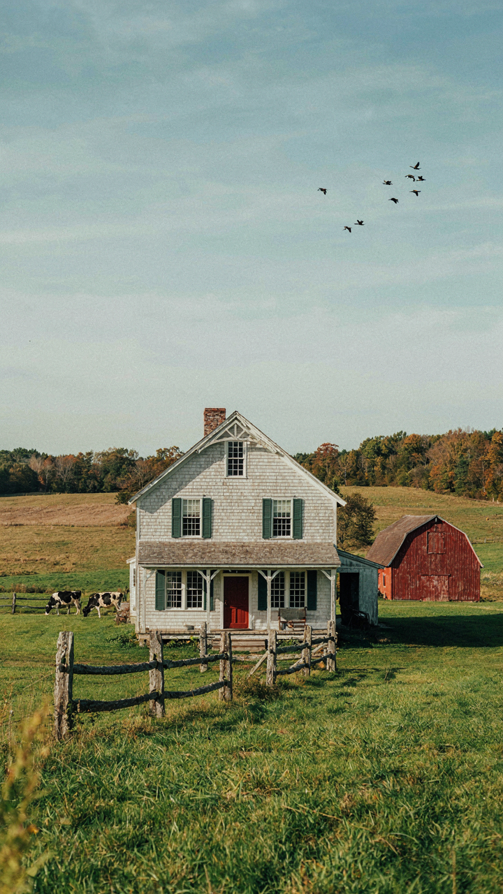 A modern new england farmhouse shows functional design and robust construction in a working