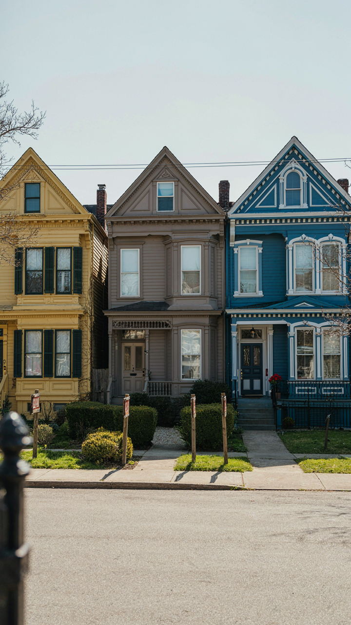 Three sold Victorian house exterior colors with different sale prices.